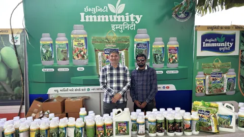 Farmers at the Immunity stall at a farmer fair